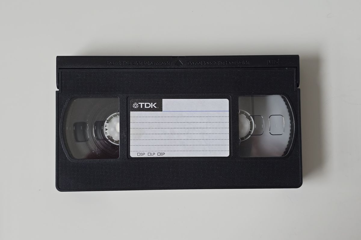 A full-size TDK VHS tape